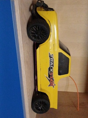 HPI gas-powered remote control car with spare parts