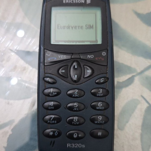 Ericsson R320s mobile phone, blue