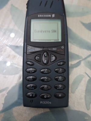 Ericsson R320s mobile phone, blue