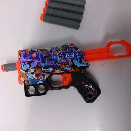 X-Shot Skins Menace toy gun used with 5 darts, graffiti design
