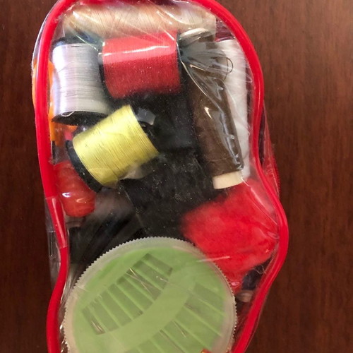 Sewing kit complete travel set with threads and needles in pouch