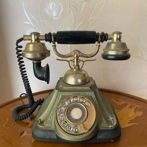 Vintage telephone device used, decorative antique