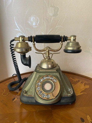 Vintage telephone device used, decorative antique
