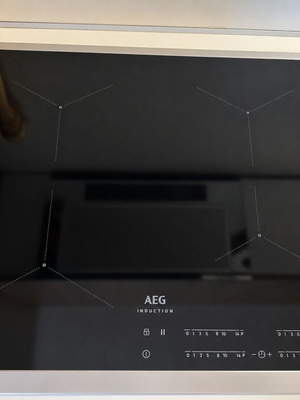 AEG IKB64431XB induction hob, black glass with inox frame