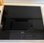AEG IKB64431XB induction hob, black glass with inox frame