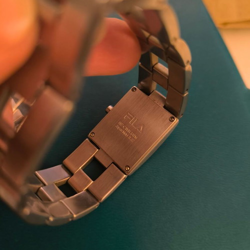Fila women's stainless steel watch like new, silver