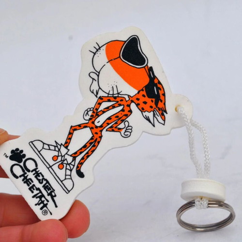 Chester Cheetah key chain holder like new, white and orange