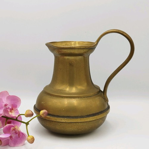Old bronze pitcher used, vintage vase