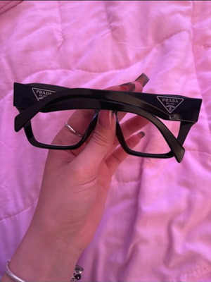 Prada eyeglasses black used with replaceable lenses