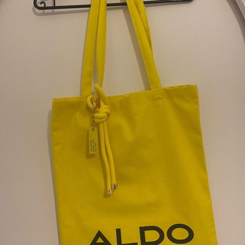 Aldo shoulder bag used, yellow with charm