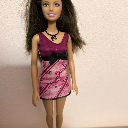 Barbie Purple Dress Doll 2002 Version like new with purple dress and black sandals
