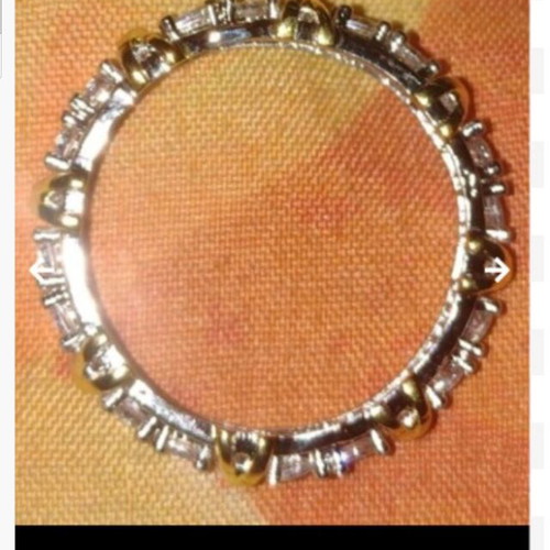 Enigma ring new, gold and silver plated with zirconia