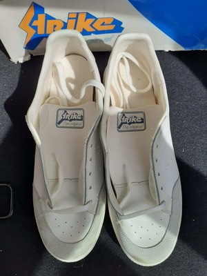 Strike athletic shoes like new
