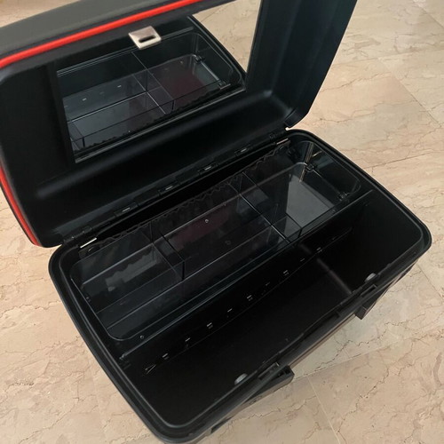Delsey travel makeup case like new, sturdy black with inner pockets
