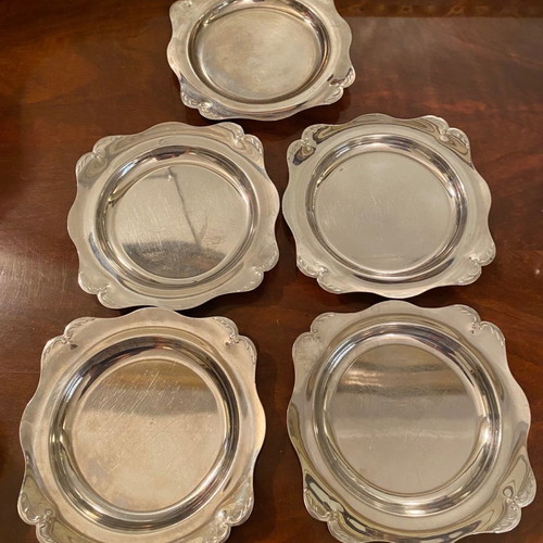Set of 5 metal small plates and 6 matching stainless steel bowls used