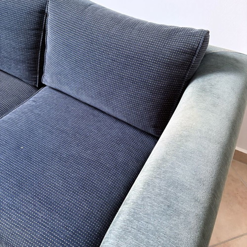 Two dark blue used two-seater sofas set