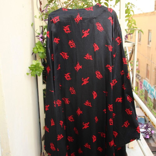 Black kimono with red ideograms like new