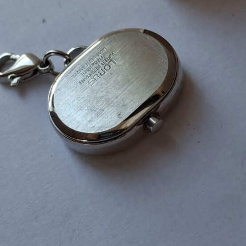 Lorus Quartz watch used, beige and silver, good condition