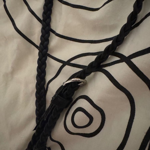 Black braided belt like new, adjustable, synthetic leather