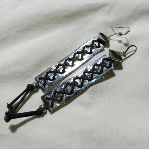 Metal earrings like new with leather cord, length 10cm