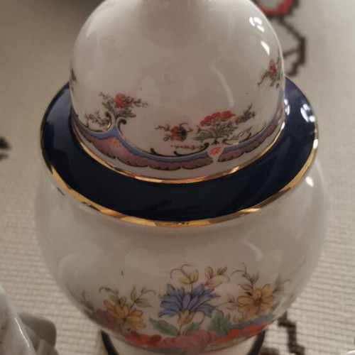 Vintage porcelain decorative set with lidded vase and 2 figurines, 3 pieces