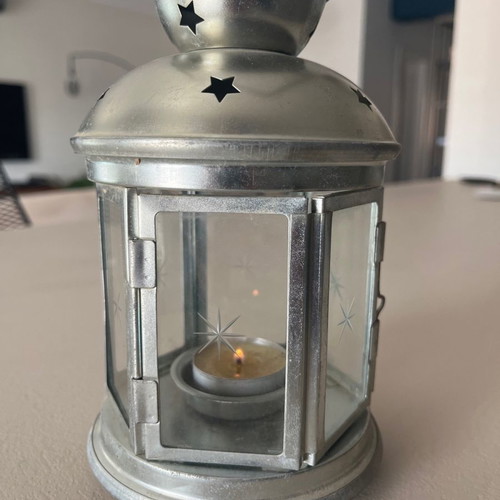 Silver candle lantern used for garden, balcony, or indoor candle