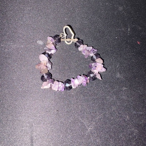 Bracelet like new with decorative black and pink stones