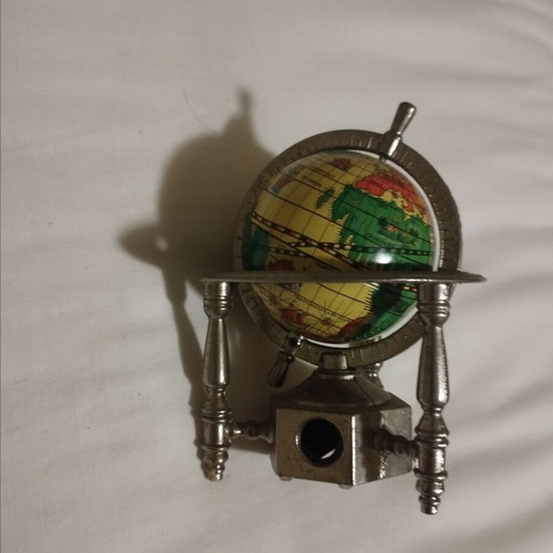 Globe pencil sharpener like new, metal decorative