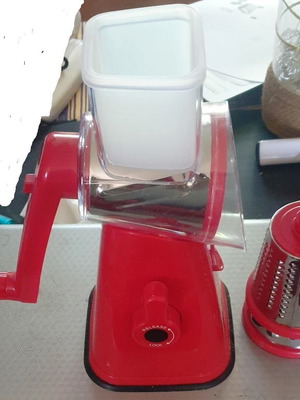 Multifunctional vegetable and cheese cutter with hand roller like new