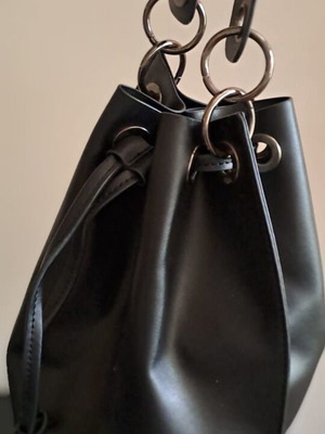 Pink Woman black bucket bag used, soft faux leather with metal details