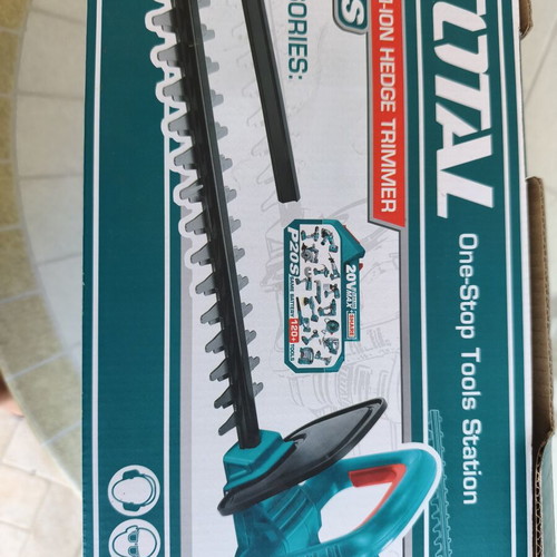 Total cordless hedge trimmer with battery and charger