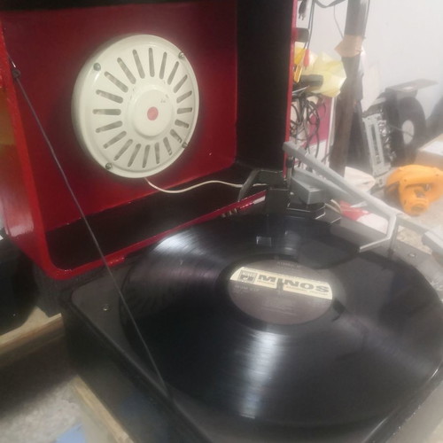 Red Garrard collectible pick up used with built-in speaker