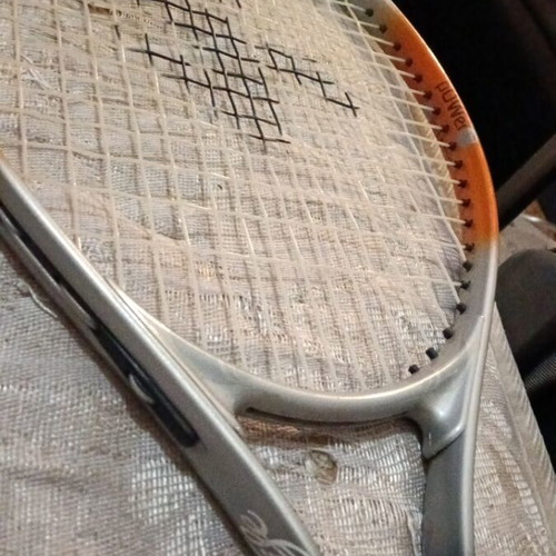 Rackets and cases used, various models including vintage Santos and Wilson