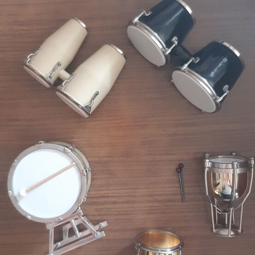 Set of miniature percussion instruments like new