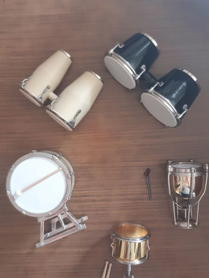 Set of miniature percussion instruments like new