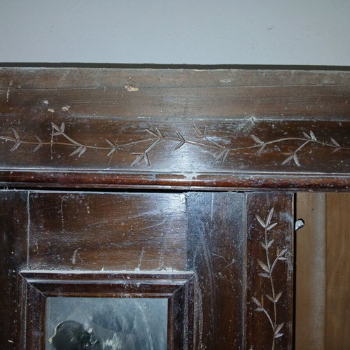 Vintage wooden antique wardrobe with mirrors and drawers