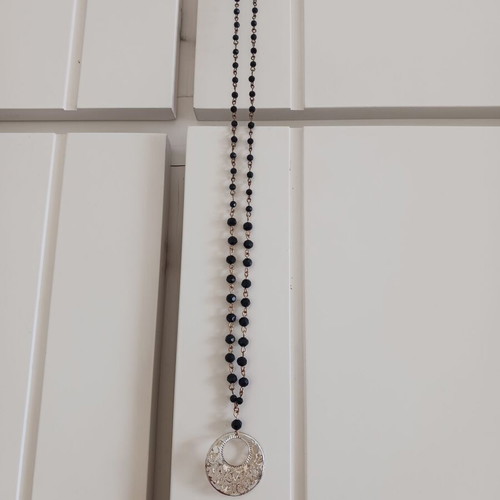 Rosary-style necklace like new with black beads and silver pendant