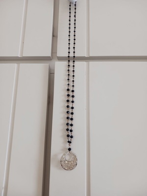 Rosary-style necklace like new with black beads and silver pendant