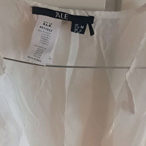 Semi-transparent white shirt size M like new, no collar, buttons
