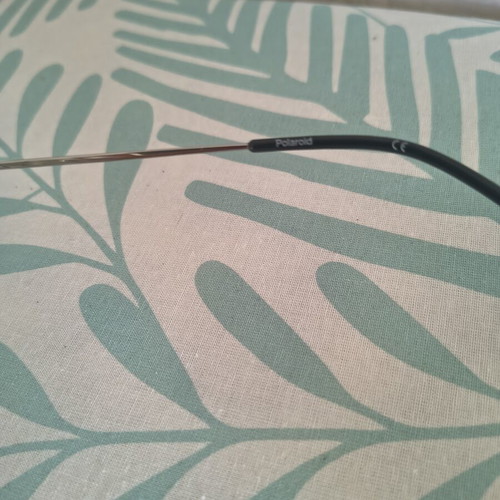 Polaroid Unisex Prescription Glasses like new, black and silver