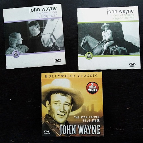 Western movie pack of 7 DVDs like new, John Wayne editions