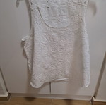 Sleeveless white top