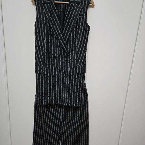 Peace and Chaos set like new, black vest and pants with white stripe