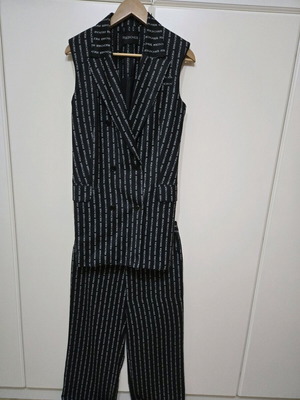 Peace and Chaos set like new, black vest and pants with white stripe