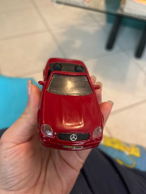Maisto figure used toy car
