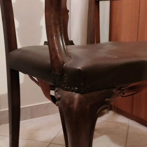 Antique armchair used, wooden with leather seat