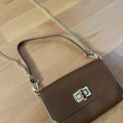 Women's brown shoulder bag new with gold details