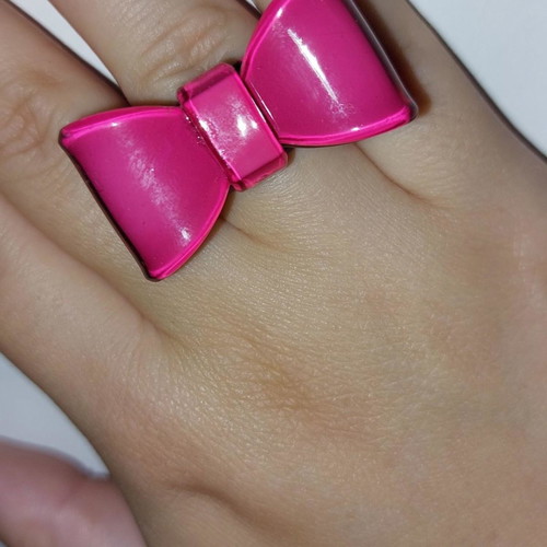 Ring used with plastic fuchsia bow