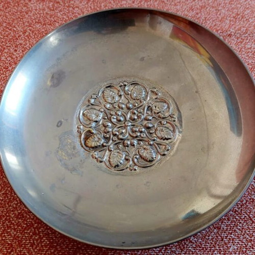 Silver-plated centerpiece bowl used with carved details and three feet