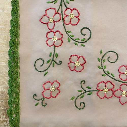 Handmade table linen with embroidery and lace used